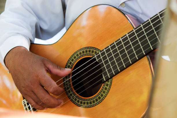 istock Man playing an acoustic guitar 1291873783