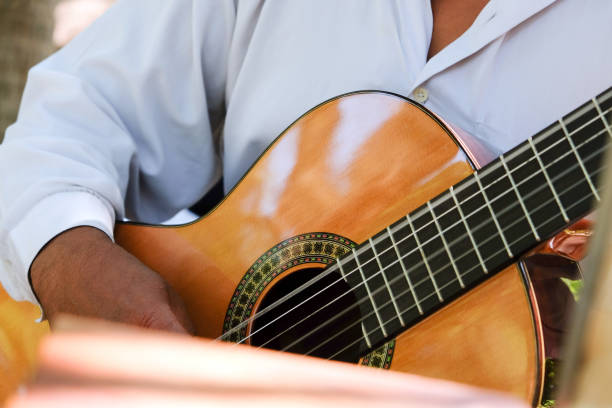 istock Man playing an acoustic guitar 1291873787
