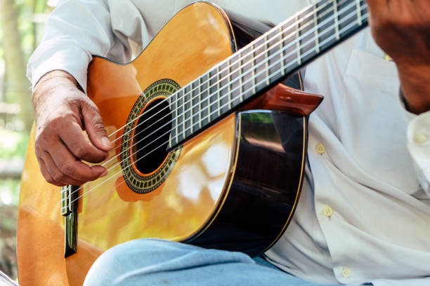 istock Man playing an acoustic guitar 1291873797
