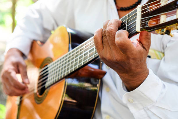 istock Man playing an acoustic guitar 1291873798