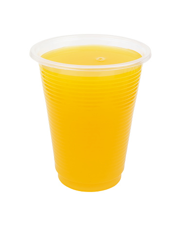 Fresh orange juice in plastic cup isolated on white background
