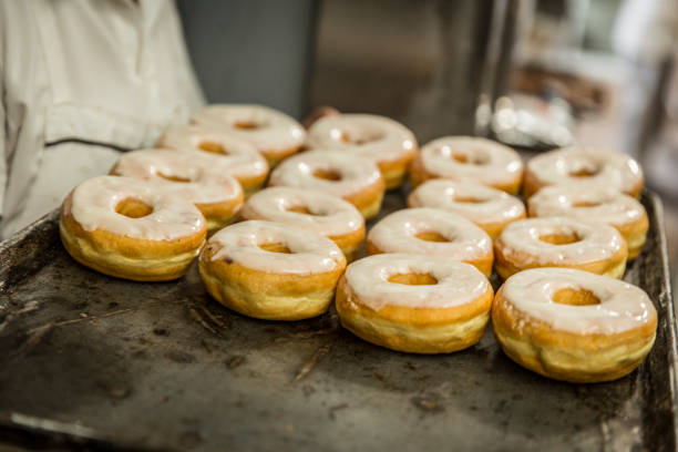 istock hands of the baker kneading the dough 1291875813