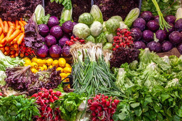 istock Fresh vegetables at greengrocer stall 1291877819