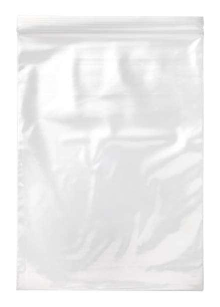 transparent plastic zipper bag transparent plastic zipper bag isolated on white background plastic bag stock pictures, royalty-free photos & images