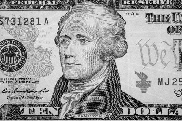 istock President Hamilton face on the ten dollar bill. 1291892446