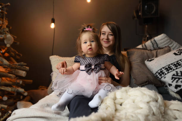 istock Mother and daughter have fun together before christmas. 1291892527