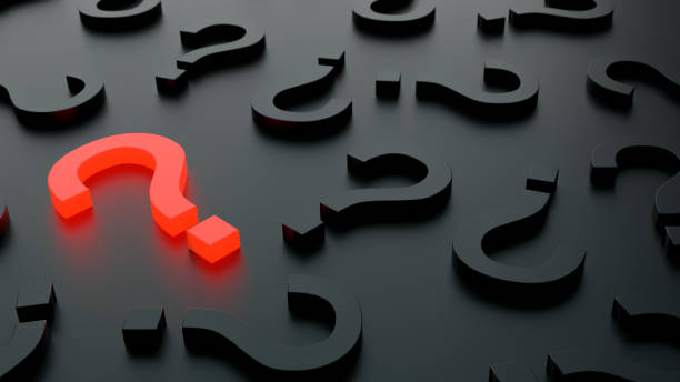 istock Red glowing question mark on a background black and grey signs. 3D Rendering 1291894526
