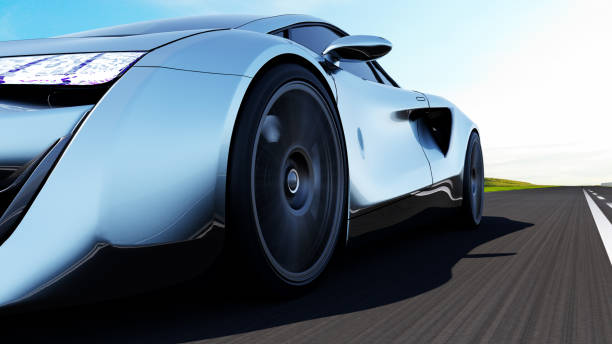 istock gray sportscar driving on a road 1291895005