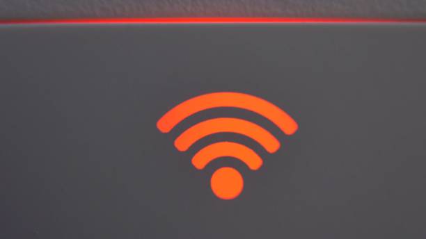 istock Wifi Internet Connection Signal Strength Indicator Light Turns Green and Red 1291895121