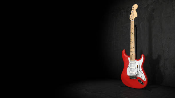 istock Digonal view of red and white electro guitar  on stand under spotlight on dark background  3d rendering 1291895933