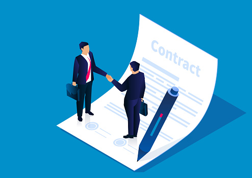 Two businessmen shaking hands to reach an agreement and successfully sign the contract, the concept of business cooperation