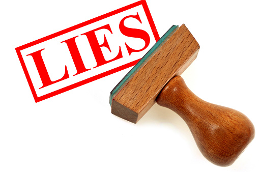 Concept of lies with an ink stamp on a white background