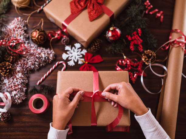 istock Wrapping Christmas gifts 1291904619