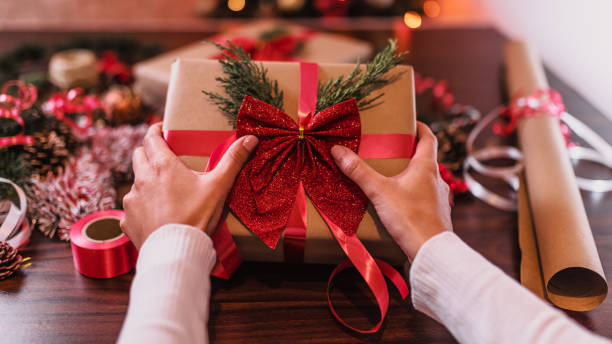 istock Wrapping Christmas gifts 1291904906