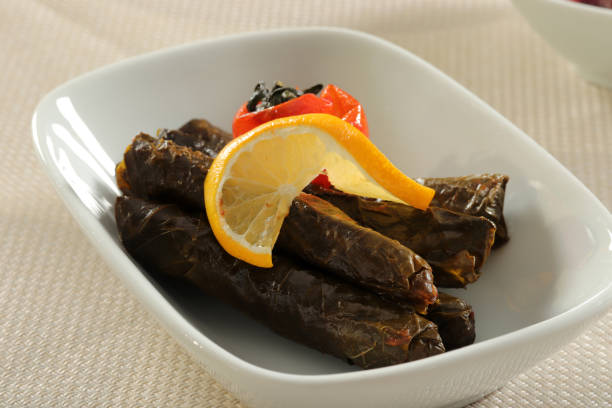 istock Dolma, Stuffed grape leaves. Traditional Turkish stuffed leaf wrapper. 1291907286