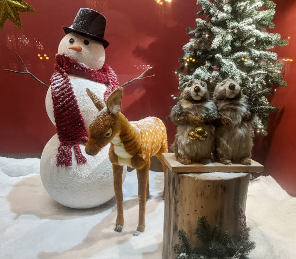 istock Christmas storefront composition behind glass window with street lights reflections 1291909143