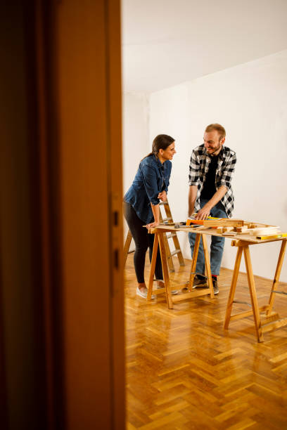 istock Couple planning home decorations and improvements 1291909228