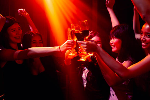 istock Young people celebrating a party, drink and dance 1291912945