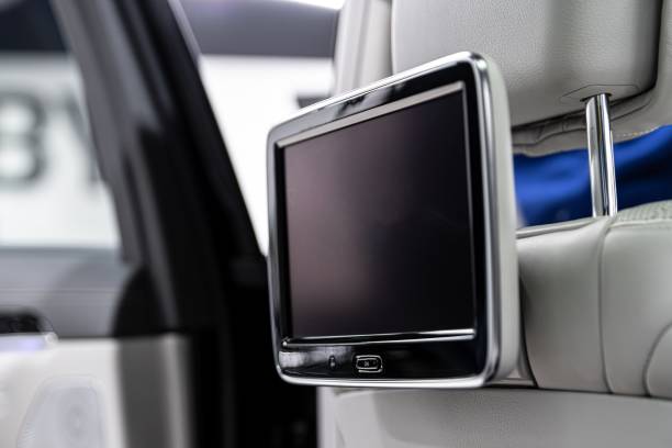 istock Modern luxury car interior with empty touchscreen monitor with copy space. 1291916169