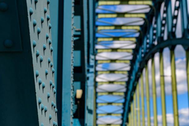Old IJsselbrug over the river IJssel between Zwolle and Hattem. View from the middle of the road on the old steel arch bridge.