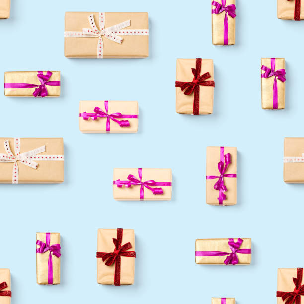 istock Seamless pattern made from gift boxes on blue background presents, gifts minimal concept seamless pattern. Abstract pattern for christmas birthday wedding 1291918499