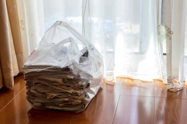 istock Old newspapers in the clear bag by the window 1291921524