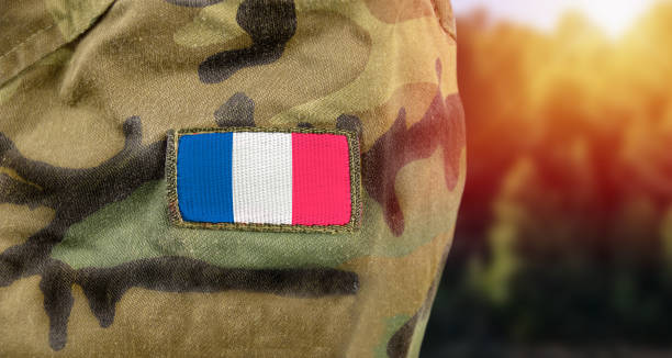 istock France flag on French army uniform 1291925614