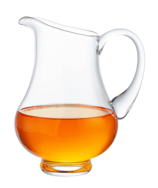 istock Glass jug for juice isolated on white 1291927144