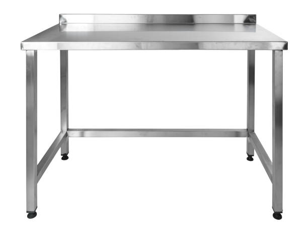 istock Metal industrial kitchen table for food preparation isolated on white 1291938697