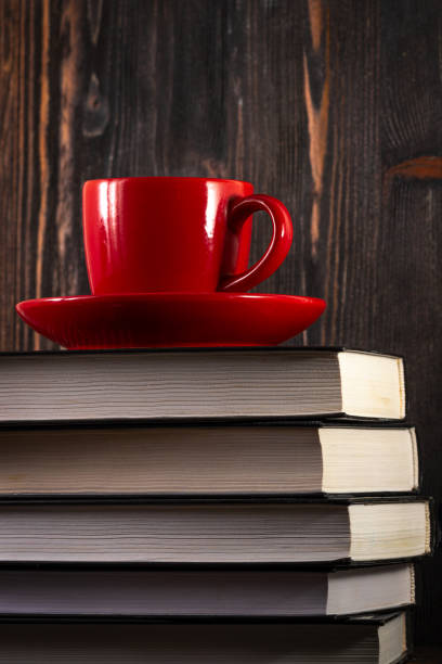 istock heap stack of book and cup of coffee 1291939306