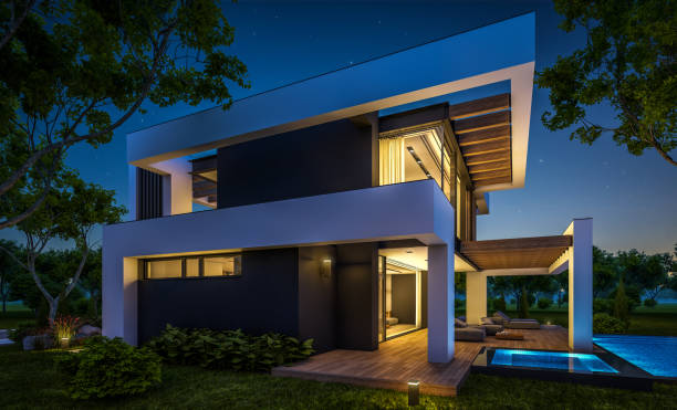 istock 3d rendering of modern house in luxurious style in night 1291940015