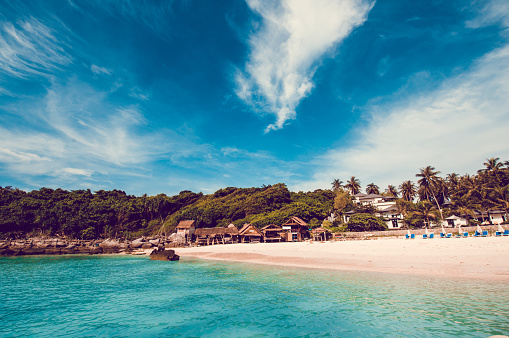 Small Huts And Hotel Resort With Beach In Maya Bay, Thailand