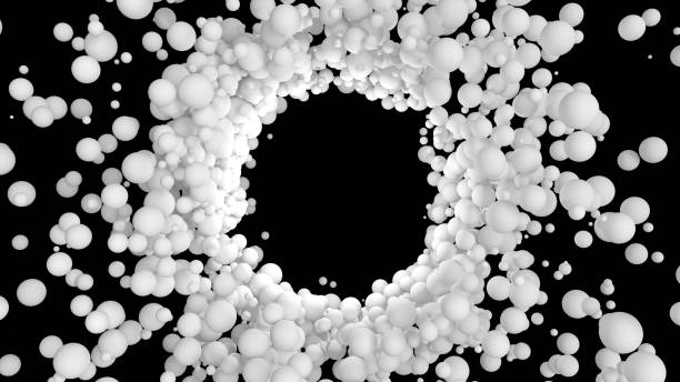 istock Particles attract to central empty hole and spin around. Vortex of spheres around blank space for logo. White balls rotate and bounce on a black background. 3d render illustration. 1291944967