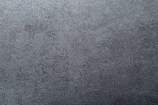 istock Concrete background. Concrete surface with texture of both stone and cement. Copy space 1291945064