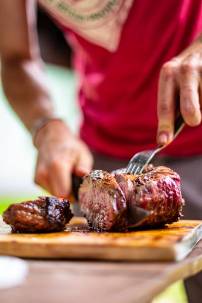 istock barbeque meat preparation in a summer day 1291946109