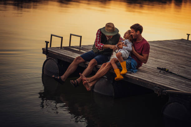 istock Family having fun on the pier 1291946143