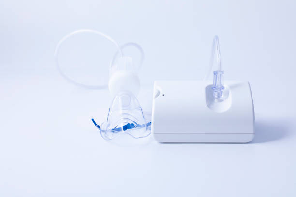 istock Nebulizer medical device for inhalation treatment on table. 1291946709