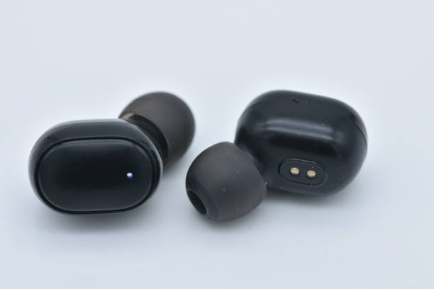 istock A pair of rechargeable ear-plug headphone 1291954200