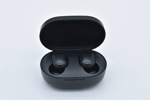 istock A pair of rechargeable ear-plug headphone 1291954856