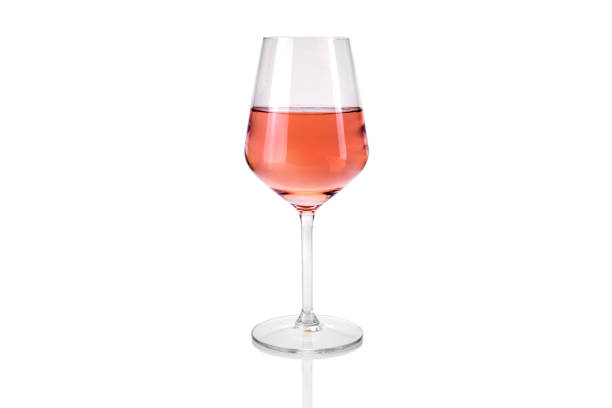 glass of rose wine isolated on the white - pink champagne fotos imagens e fotografias de stock