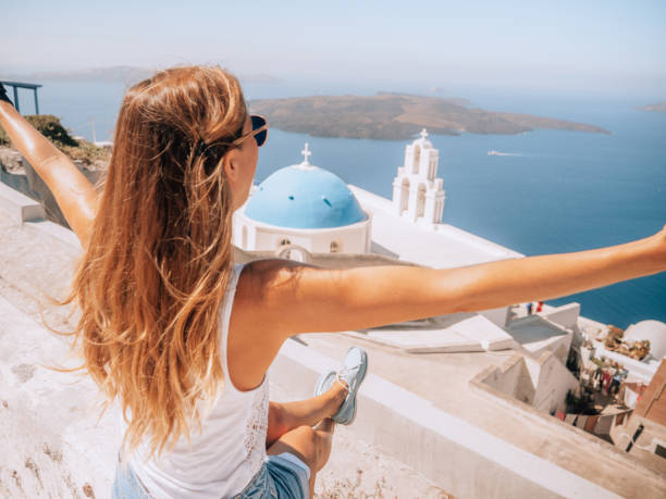 istock Woman enjoys vacations in Greece 1291961166