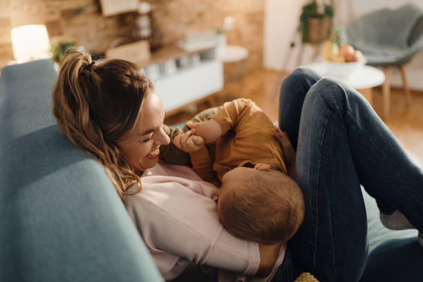 istock Playful mother having fun with her small son at home. 1291962781