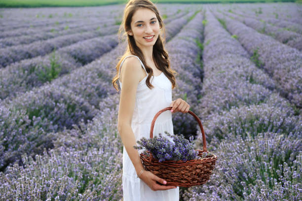 istock Young girl in lavender field 1291967135