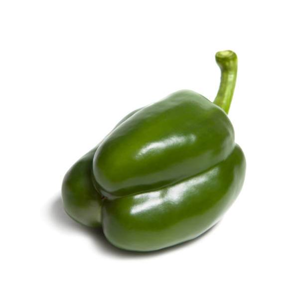 istock Green bell pepper isolated on white background 1291971631