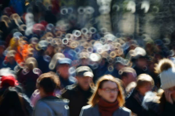 Moscow, Russia - May 9, 2013: Crowd on Moscow street during 65th anniversary of Victory Day. In monochrome.