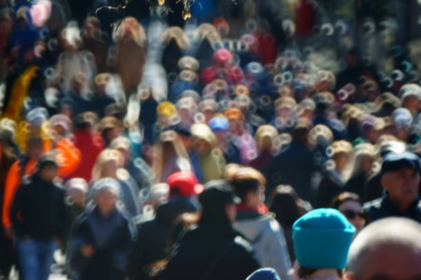 extured Background Photography. People walking in the park. Blurred photo.