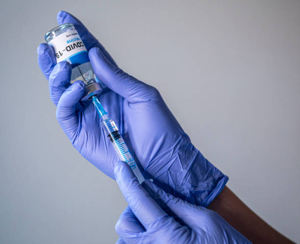 istock COVID-19 coronavirus vaccine in doctor hands 1291972900