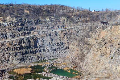 View of granite quarry. Pumping groundwater from quarry