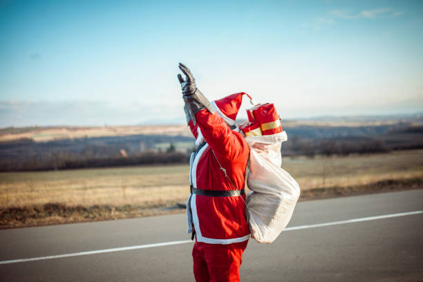 istock Young Santa Claus Wearing Protective Face Mask 1291974836