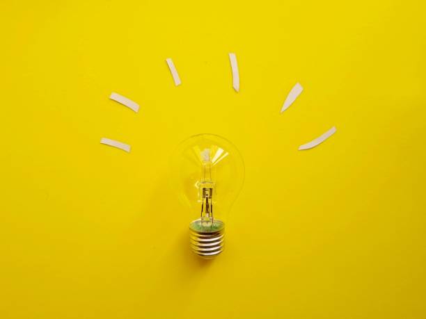 istock conceptual photo of a light bulb that turns on (concept of idea) 1291975041